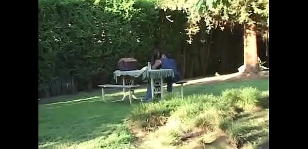  A bald black dude fucks a cute ebony whore with a cool ass in all positions in the backyard